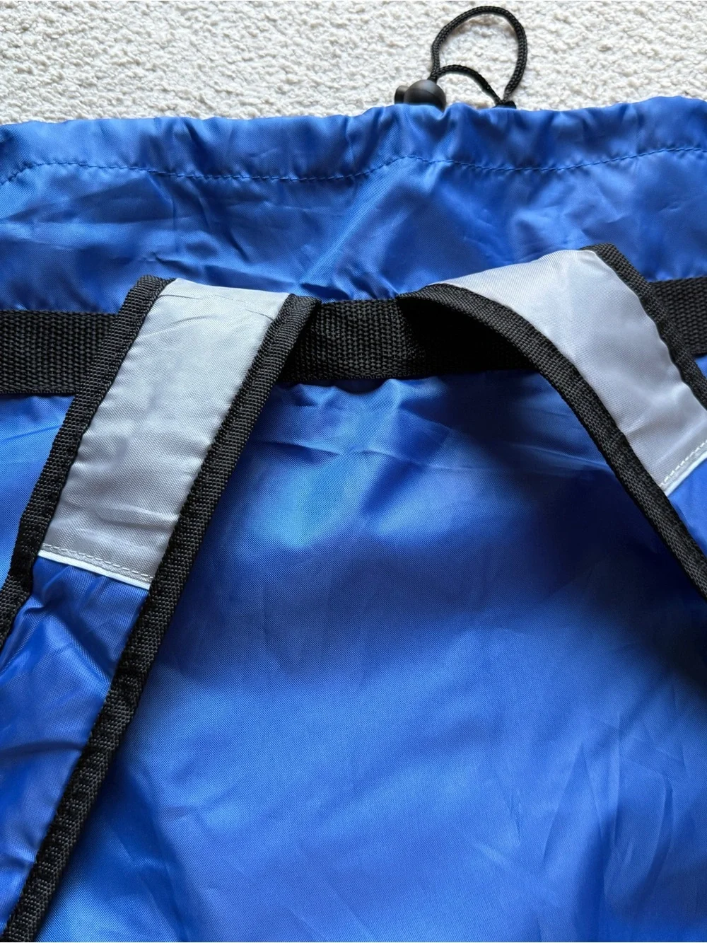 Blue Drawstring Backpack with Gray Accents